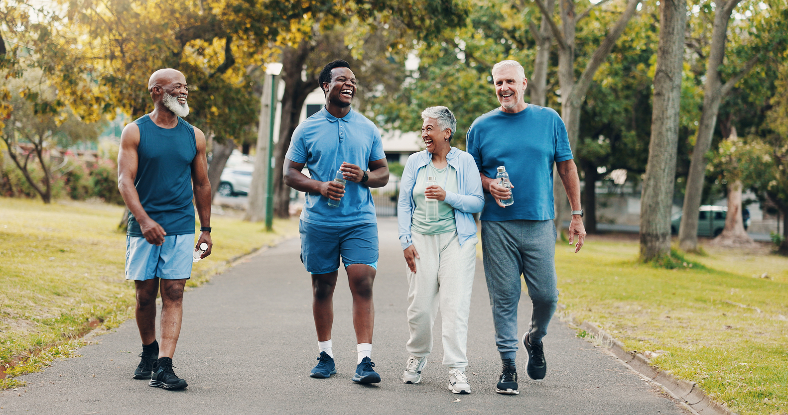 a woman doing tai chi with a group of people