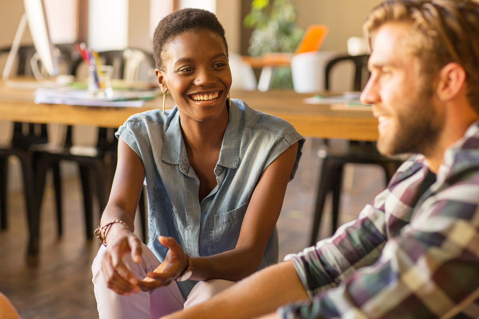 Two men walking while in conversation